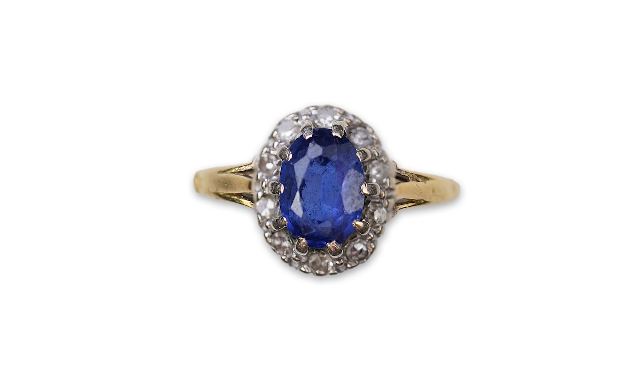 A synthetic sapphire and diamond cluster ring, mid 20th century